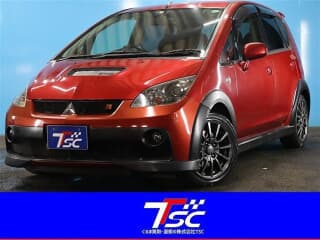 三菱の コルトの中古車 with 4 seats and color レッドメタリック
