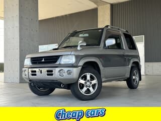 三菱の パジェロミニの中古車 with 4 seats and color シルバーツートン