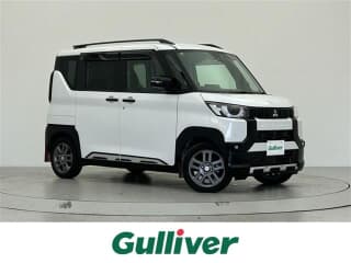 三菱の デリカミニの中古車 with 4 seats and color ホワイト